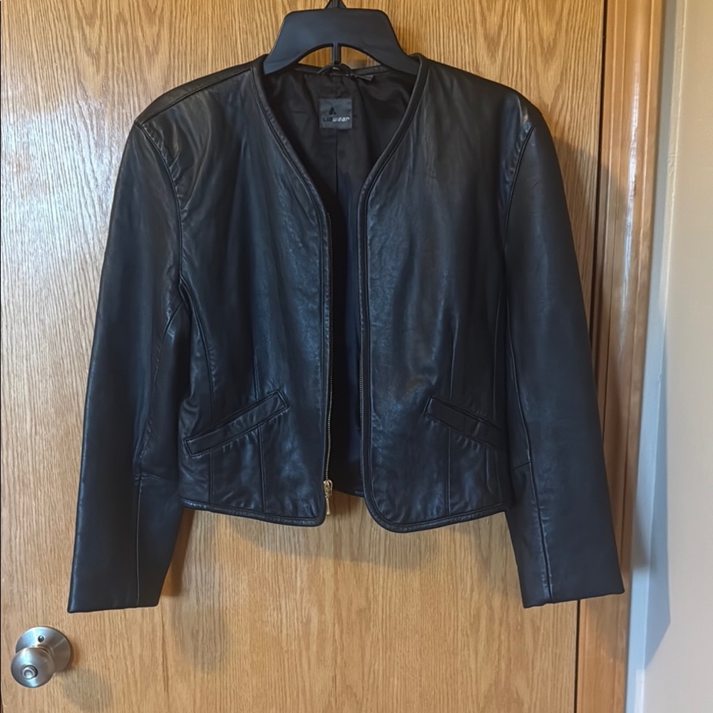 Black Leather Motorcycle Jacket with Zipper Details
